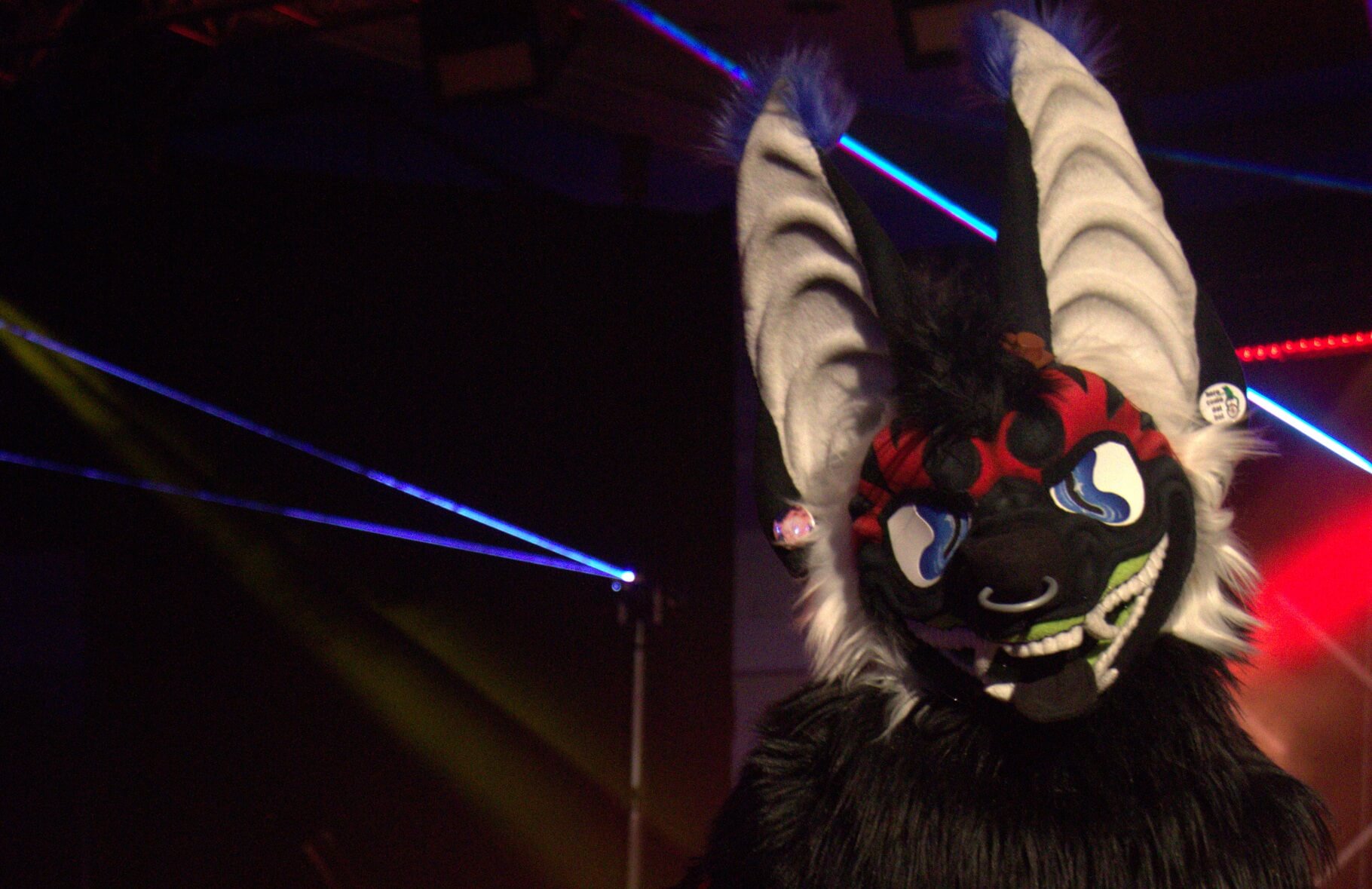 Fursuiter in the dance competition at ConFuzzled 2024