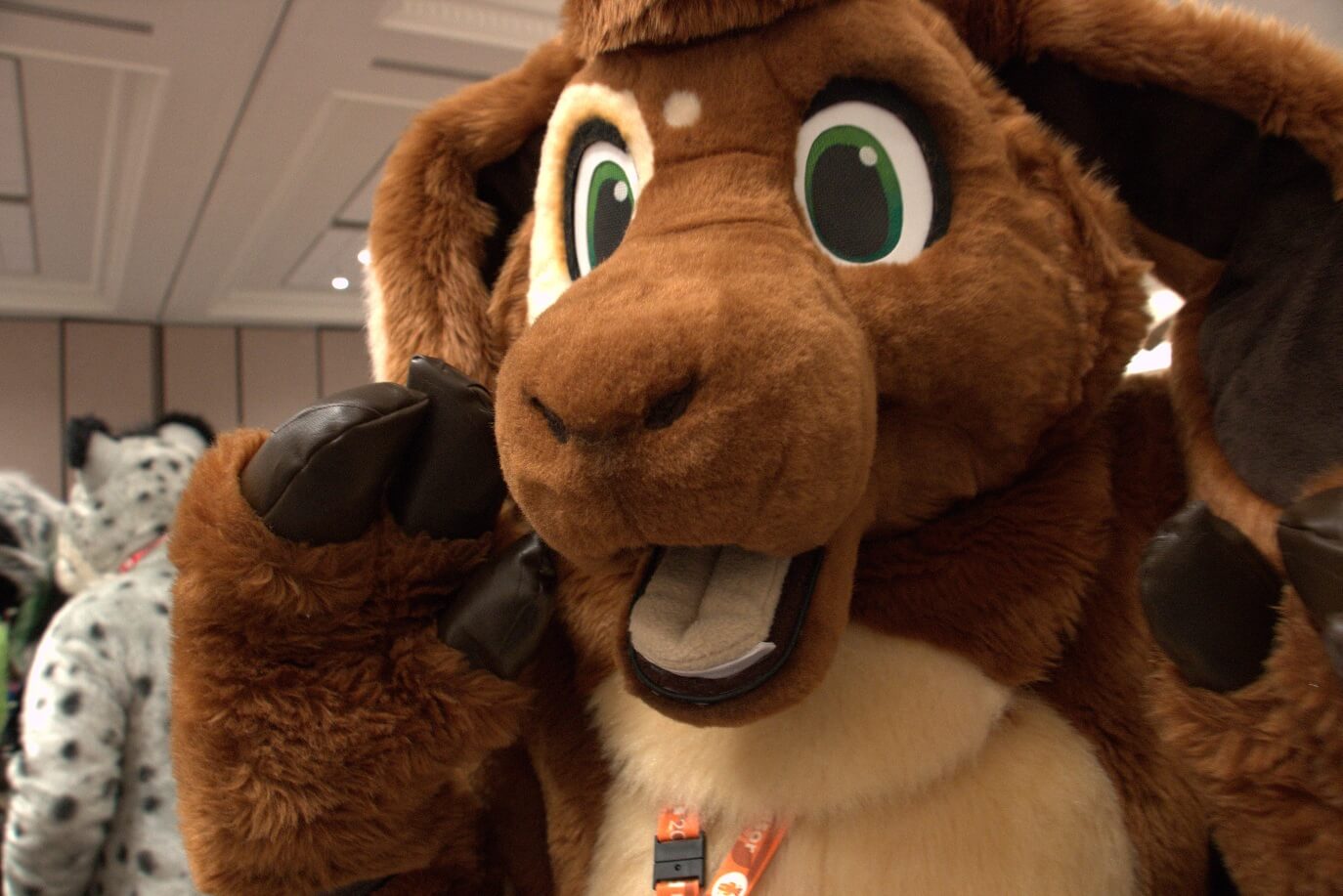 Closeup of a fursuiter at a event at ConFuzzled 2024